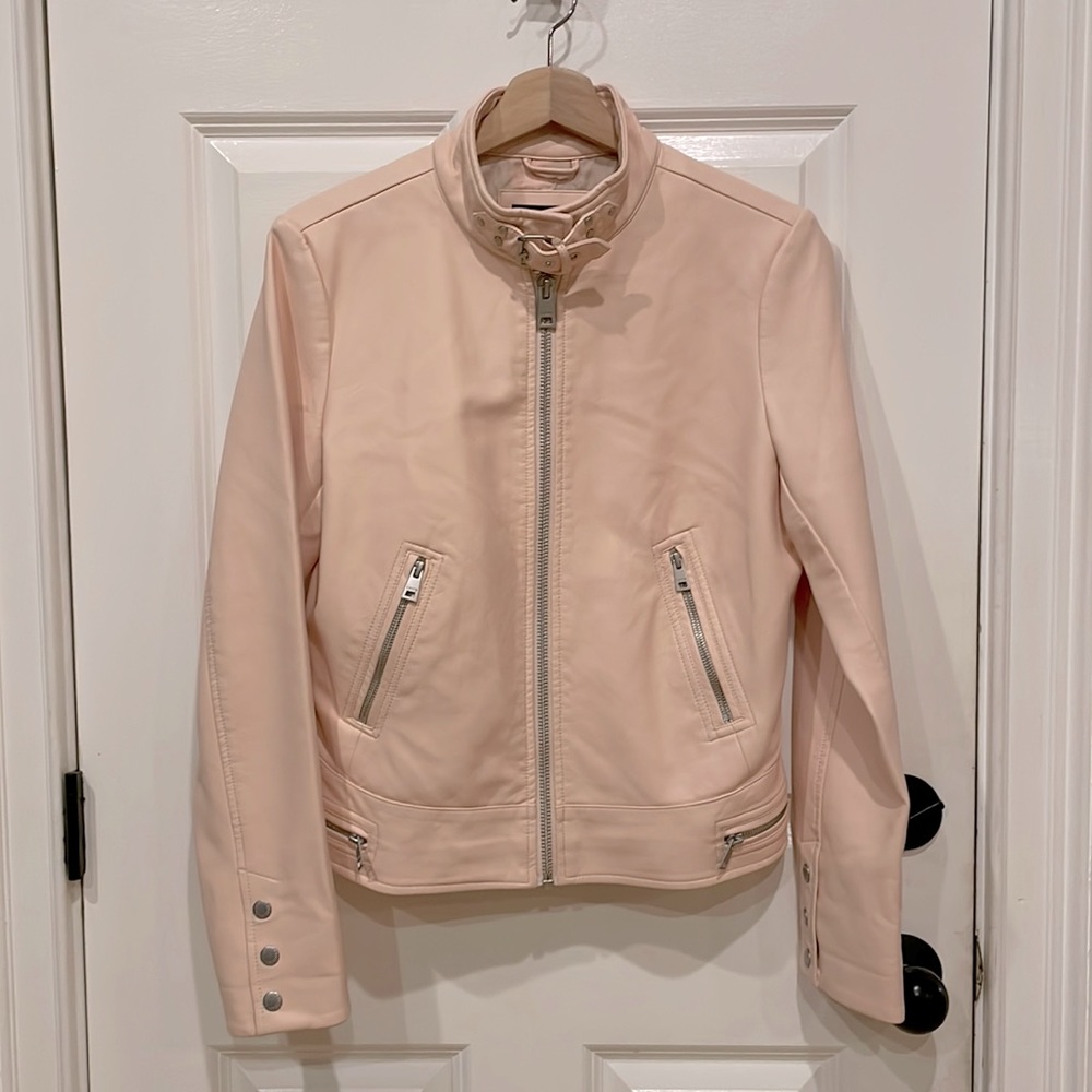 Levi’s Levis Strauss light pink faux leather motorcycle jacket.